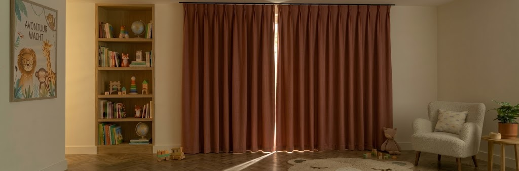 Verduisterende gordijnen op maat in een kinderkamer